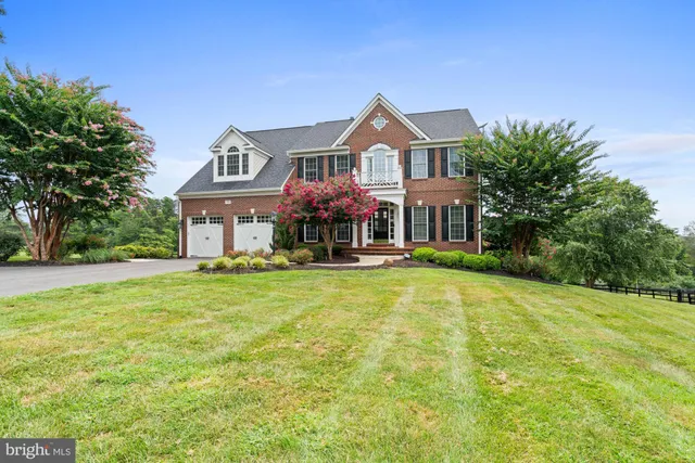 a front view of a house with a porch