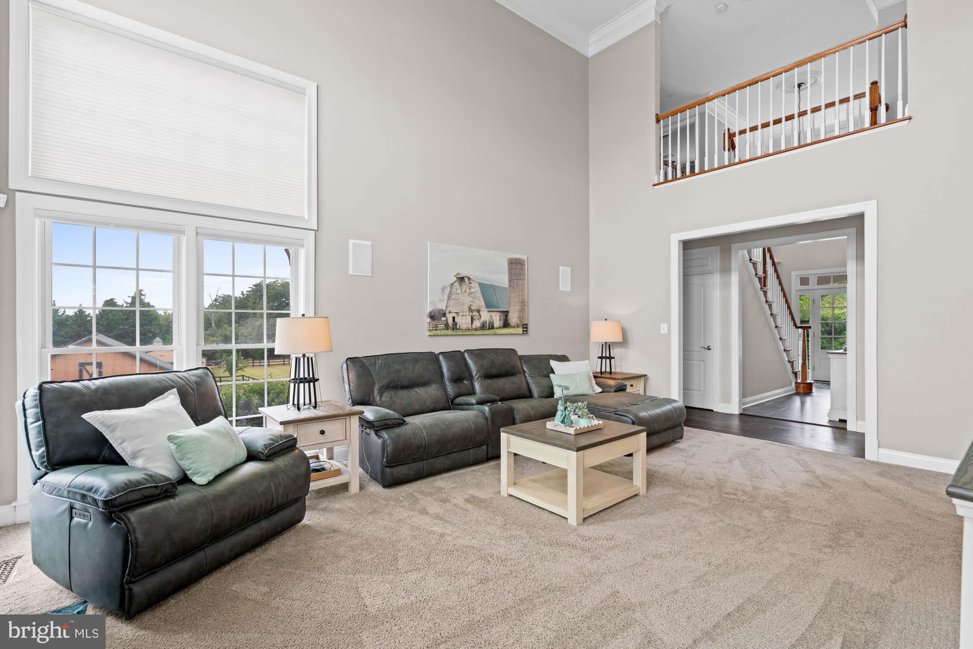 9163 Old Waterloo Road Warrenton, VA 20186 - Photo 14 of 73 a living room with furniture and a large window