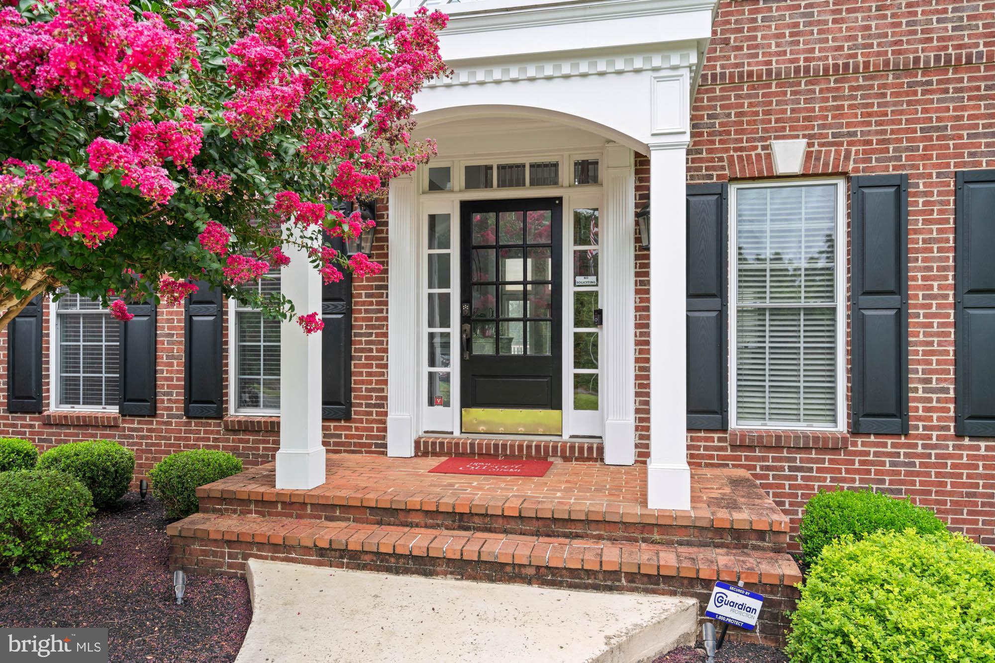 9163 Old Waterloo Road Warrenton, VA 20186 - Photo 2 of 73 a front view of a house with a porch