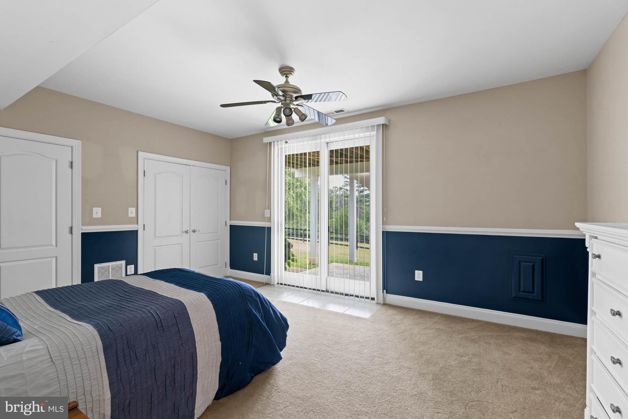 9163 Old Waterloo Road Warrenton, VA 20186 - Photo 39 of 73 a spacious bedroom with a bed and a dresser