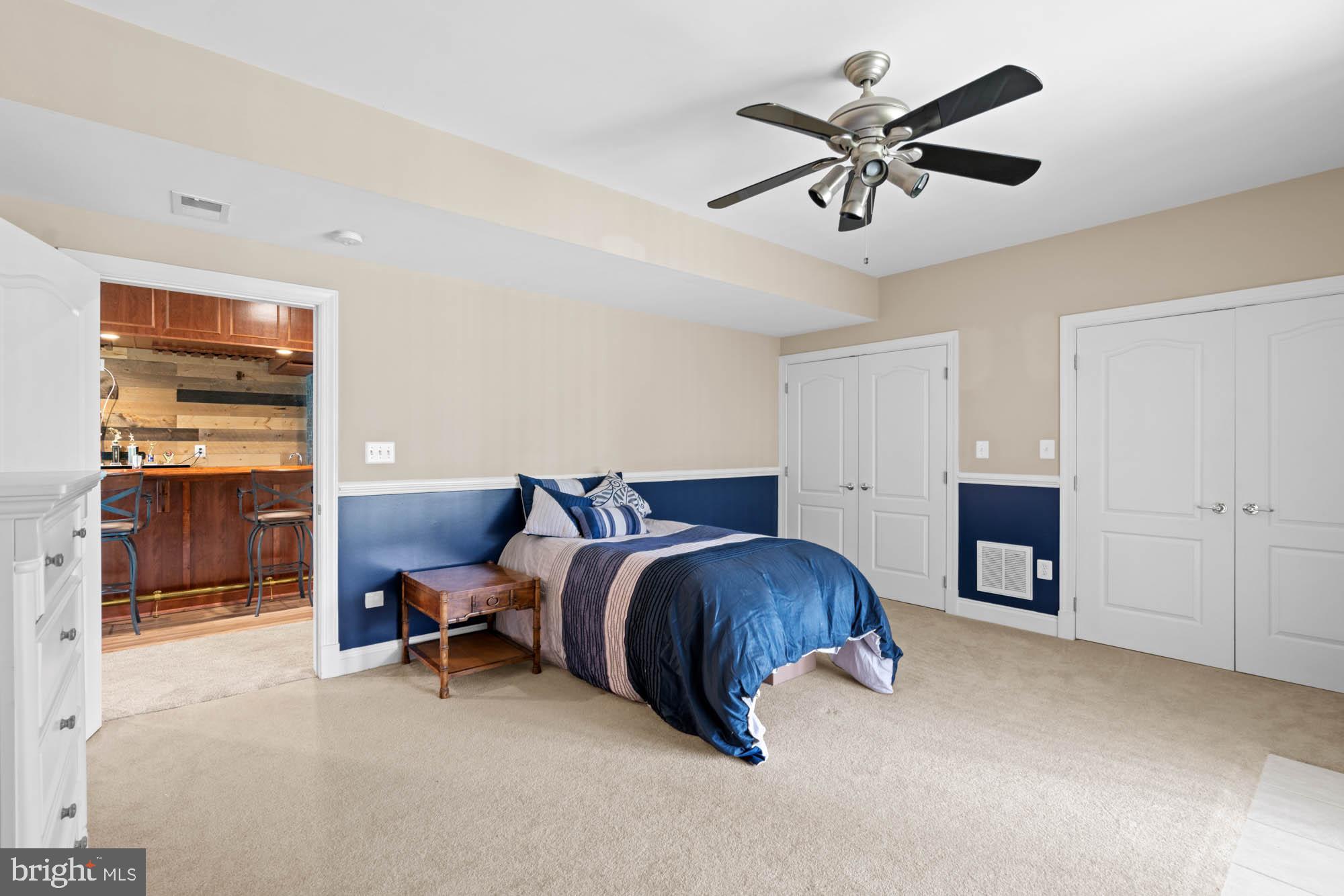9163 Old Waterloo Road Warrenton, VA 20186 - Photo 40 of 73 a living room with furniture and a ceiling fan