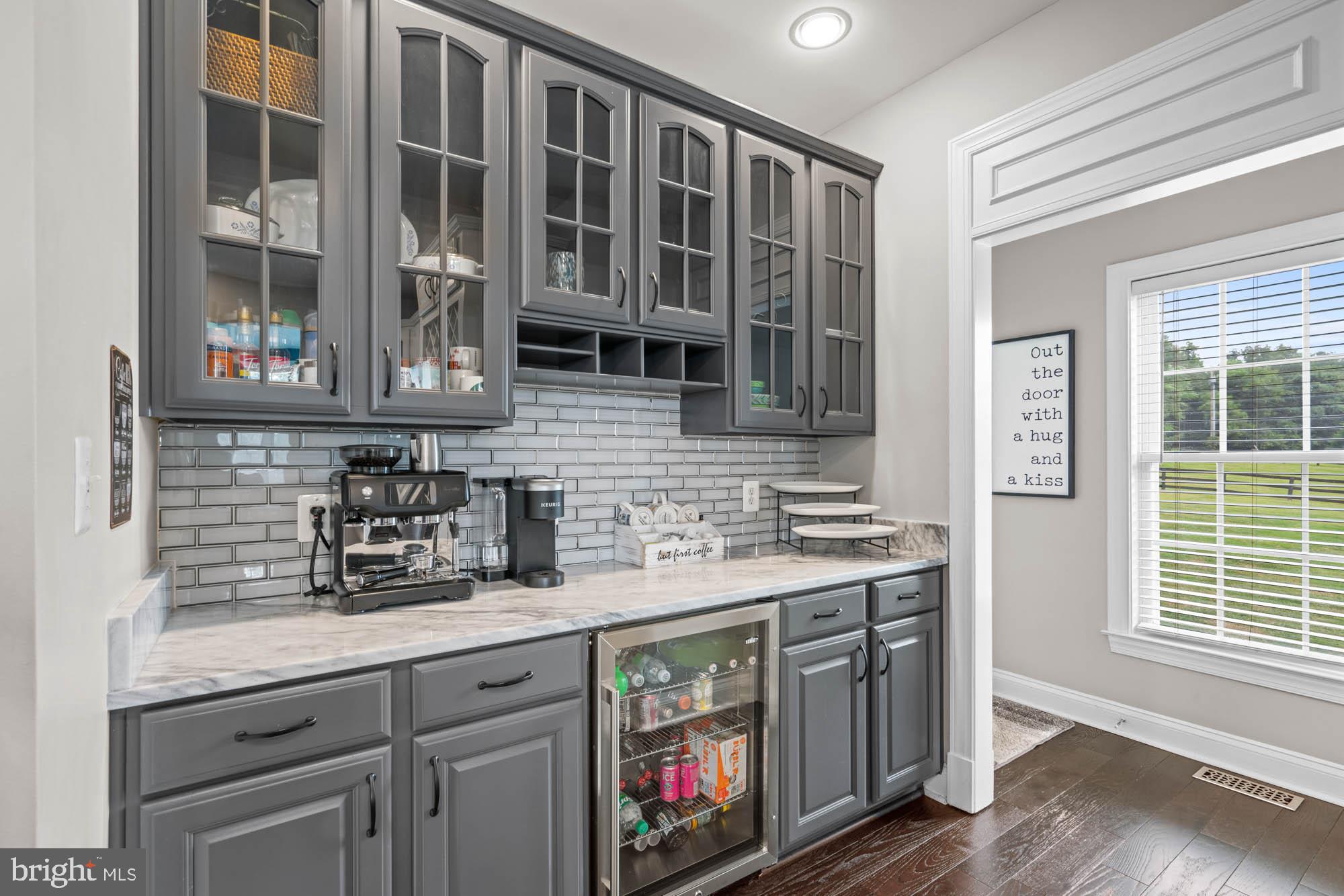 9163 Old Waterloo Road Warrenton, VA 20186 - Photo 10 of 73 a kitchen with stainless steel appliances granite countertop a stove and a sink