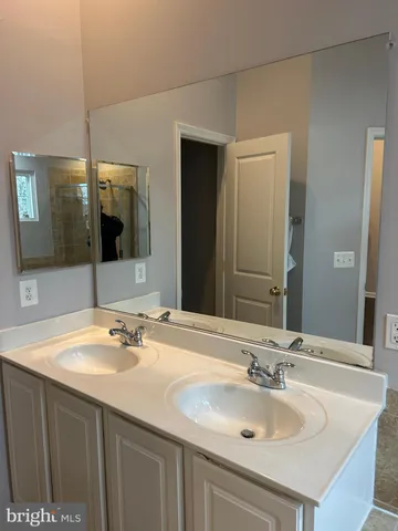 a view of balcony with wooden floor