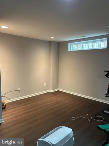 a bathroom with a sink a mirror and a toilet