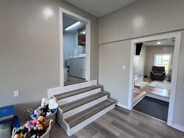 a room with furniture and a window