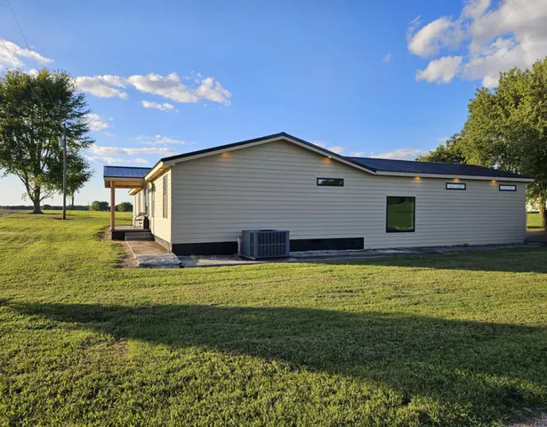 a front view of house with yard