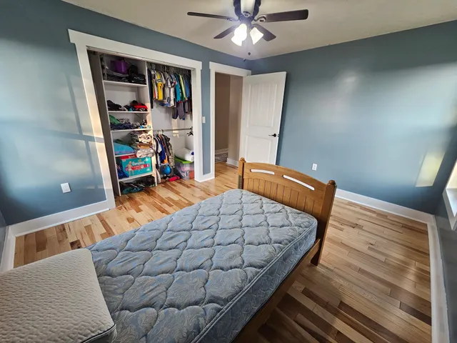 a view of a living room filled with furniture