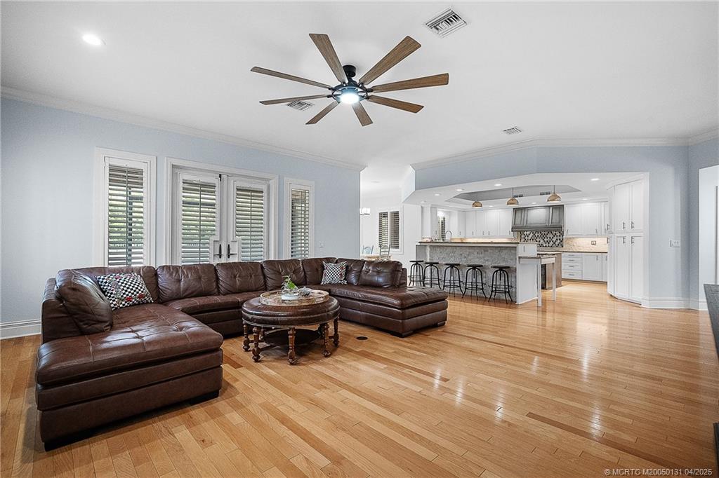 6655 Southwest Gaines Avenue Stuart, FL 34997 - Photo 22 of 48 a living room with furniture and window
