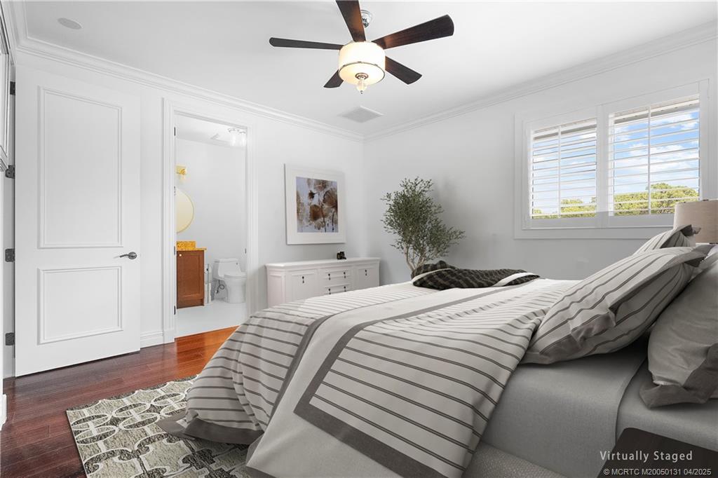 6655 Southwest Gaines Avenue Stuart, FL 34997 - Photo 25 of 48 a bedroom with bed and window