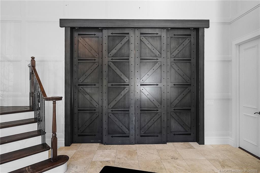 6655 Southwest Gaines Avenue Stuart, FL 34997 - Photo 26 of 48 a view of a door and a window