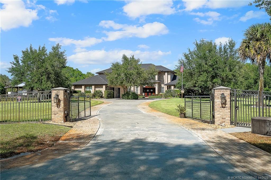 6655 Southwest Gaines Avenue Stuart, FL 34997 - Photo 48 of 48 a view of a park with swings and slides