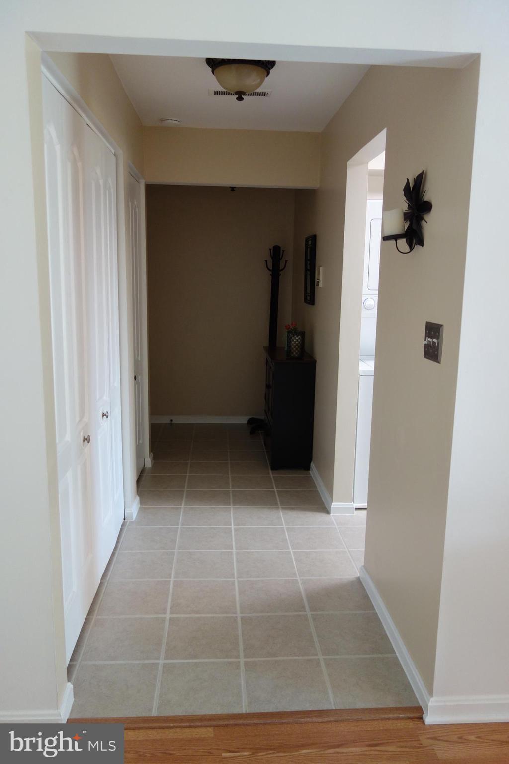 8559 Falls Run Road, Unit K Ellicott City, MD 21043 - Photo 22 of 23 Hallway wall of closets