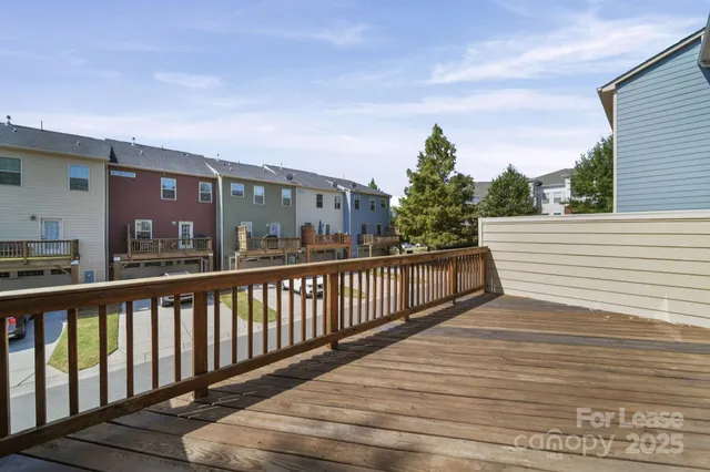 a view of balcony with furniture