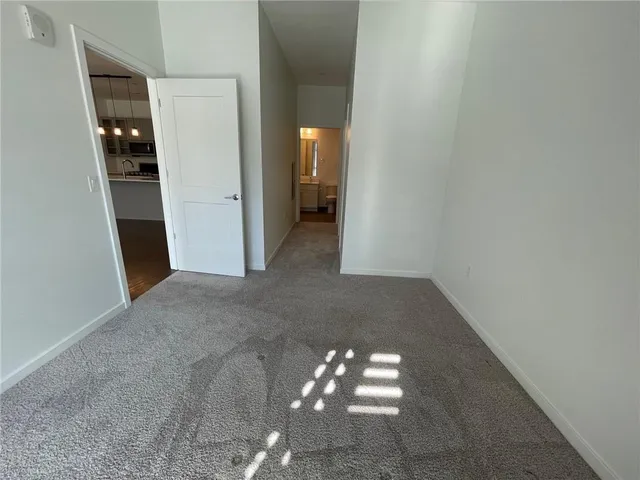 a view of balcony with furniture