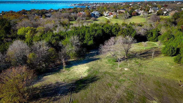 a view of a garden with a lake