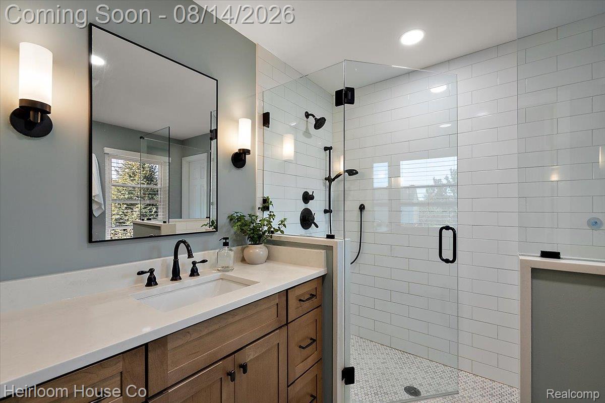 45697 Bryn Mawr Road Canton, MI 48187 - Photo 14 of 75 Contemporary bathroom with a clear glass shower enclosure, white subway tile surround, and a mosaic tile shower floor