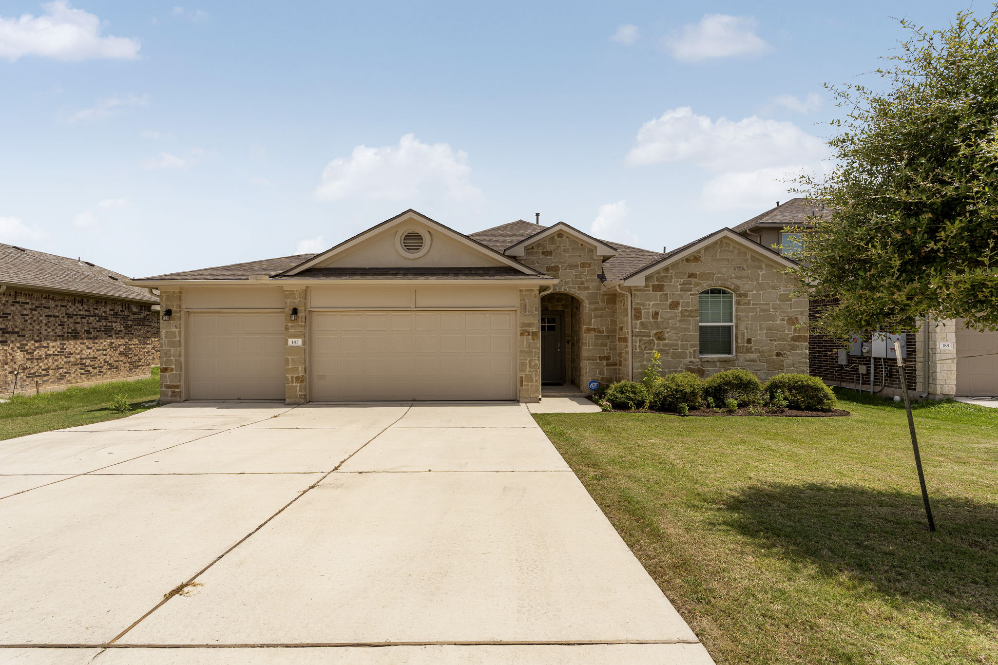 185 Struss Drive Georgetown, TX 78626 - Photo 1 of 23 An inviting stone facade and generous driveway welcome you to this charming single-story residence.