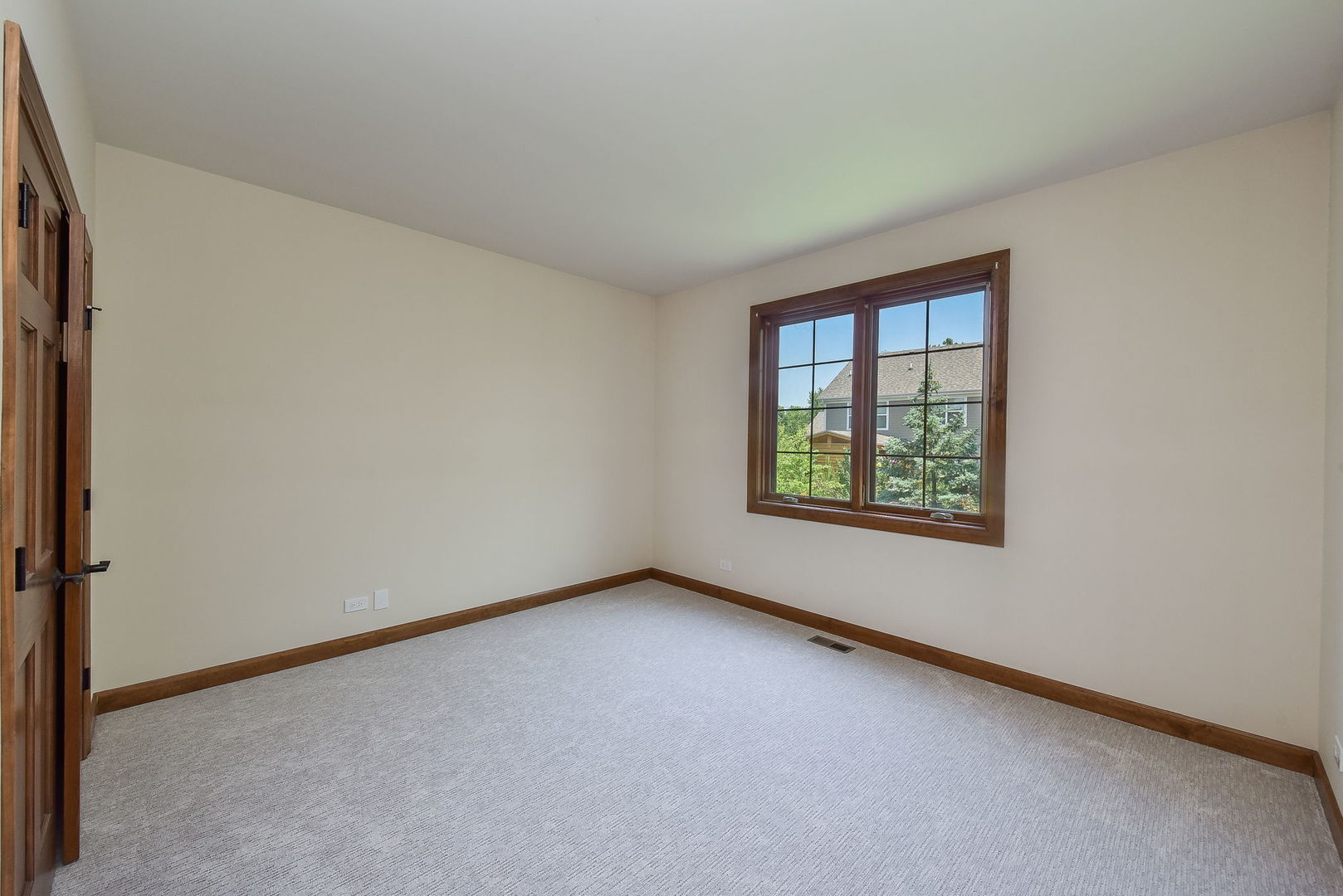 2003 Mackenzie Place Wheaton, IL 60187 - Photo 20 of 25 an empty room with windows