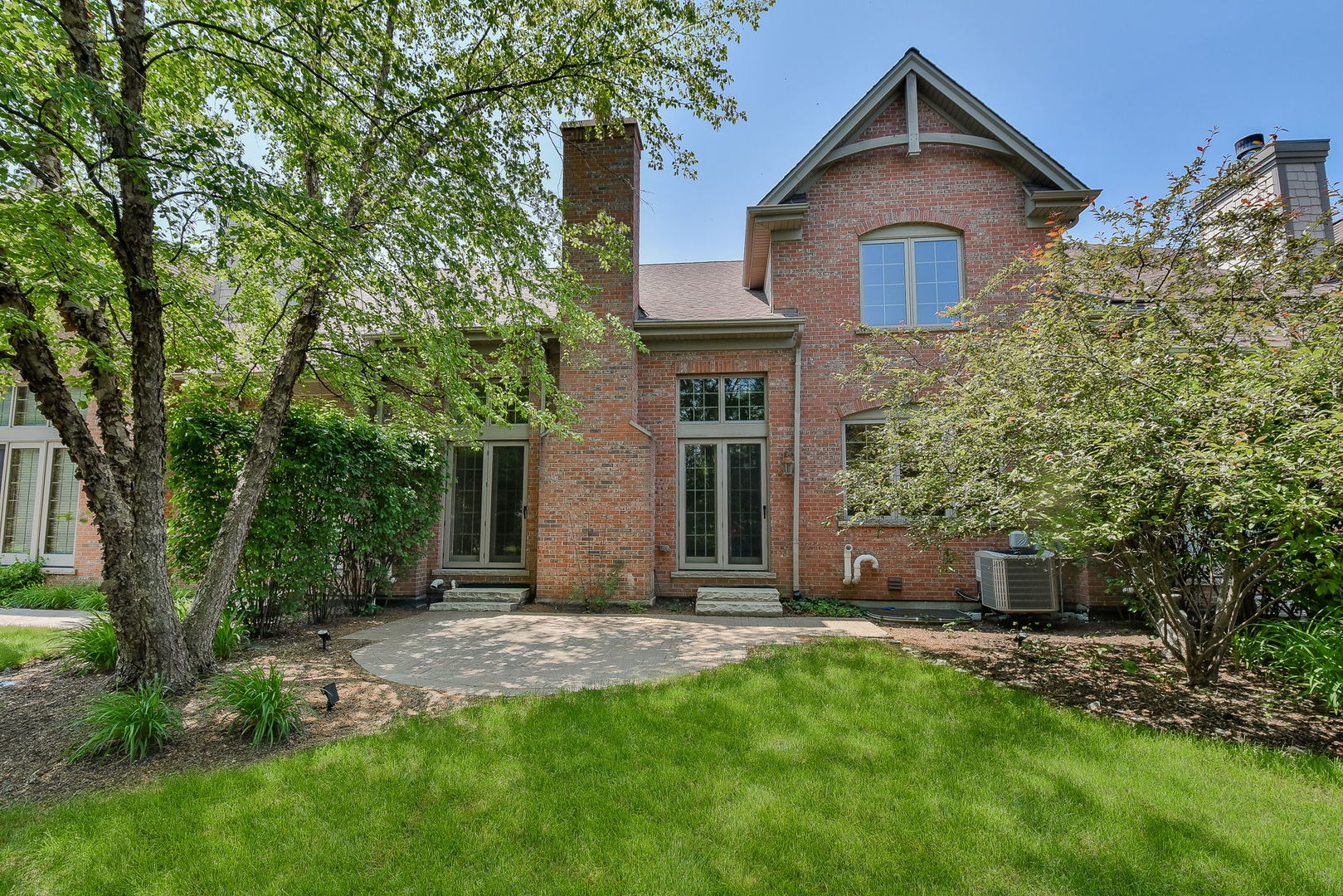 2003 Mackenzie Place Wheaton, IL 60187 - Photo 23 of 25 front view of a house with a yard