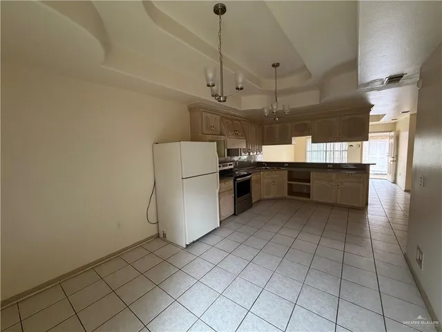 a view of a hallway with a white door