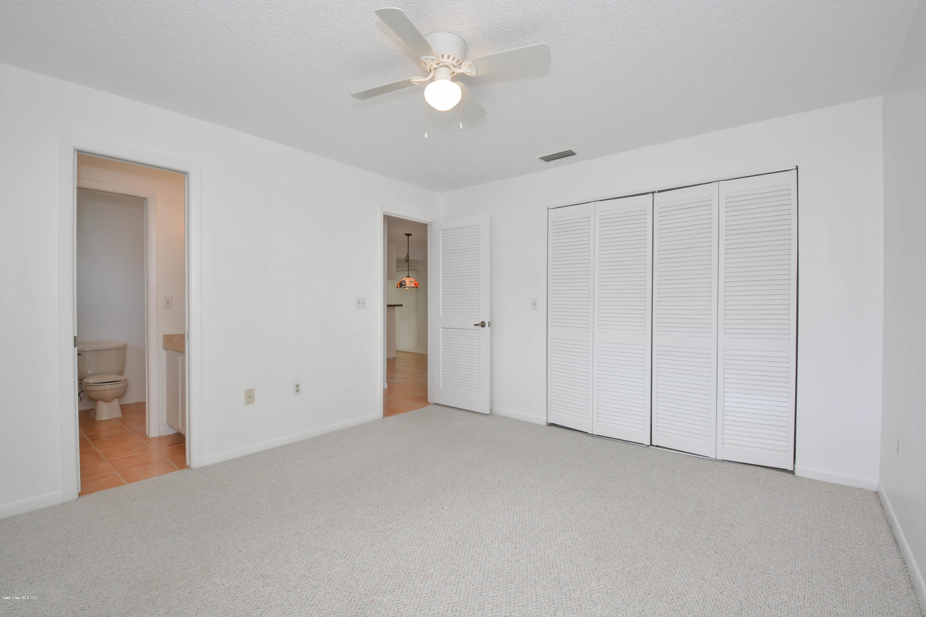 610 North Wickham Road, Unit 74 Melbourne, FL 32935 - Photo 17 of 46 a view of an empty room