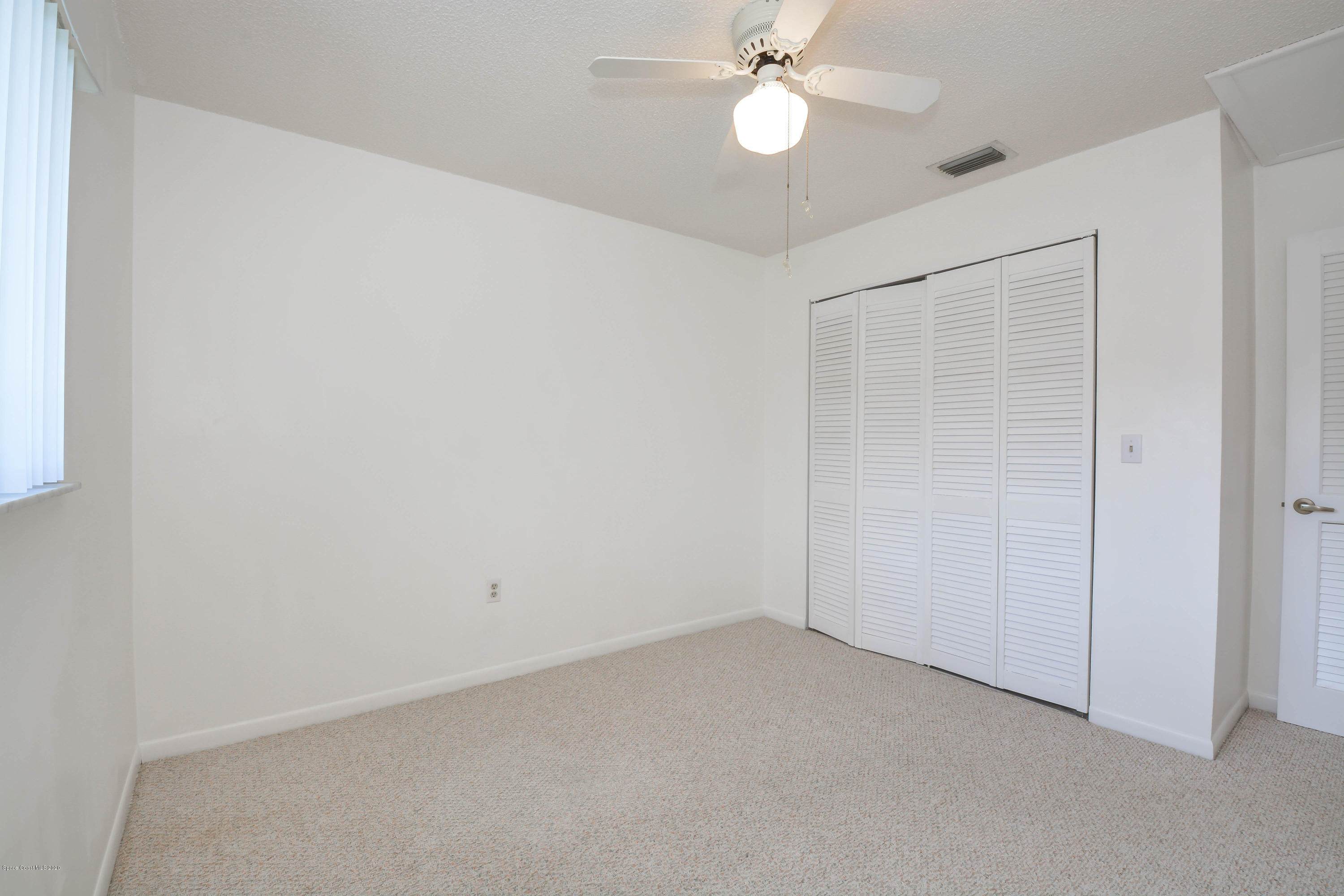 610 North Wickham Road, Unit 74 Melbourne, FL 32935 - Photo 20 of 46 a view of an empty room