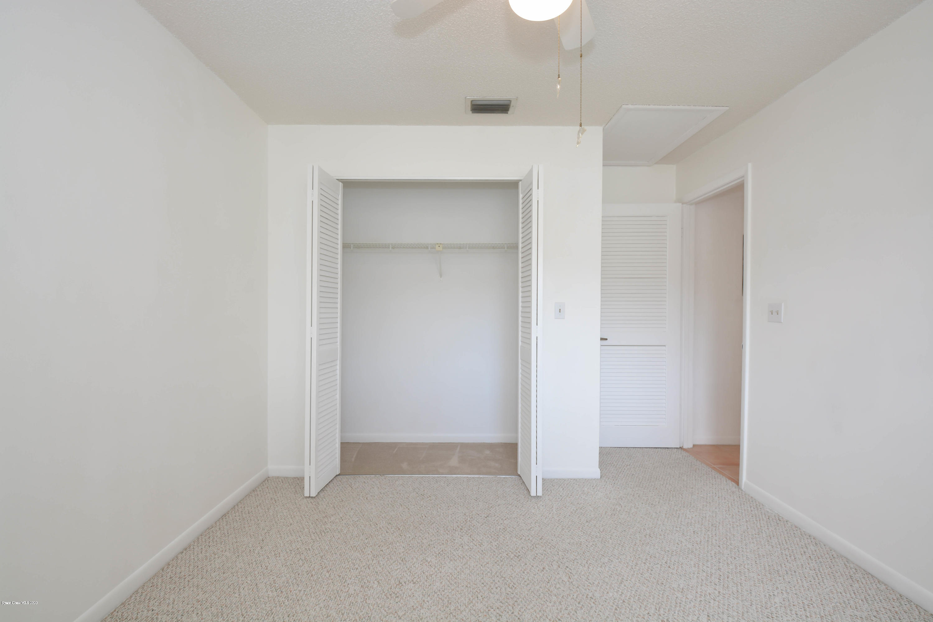 610 North Wickham Road, Unit 74 Melbourne, FL 32935 - Photo 21 of 46 a view of an empty room