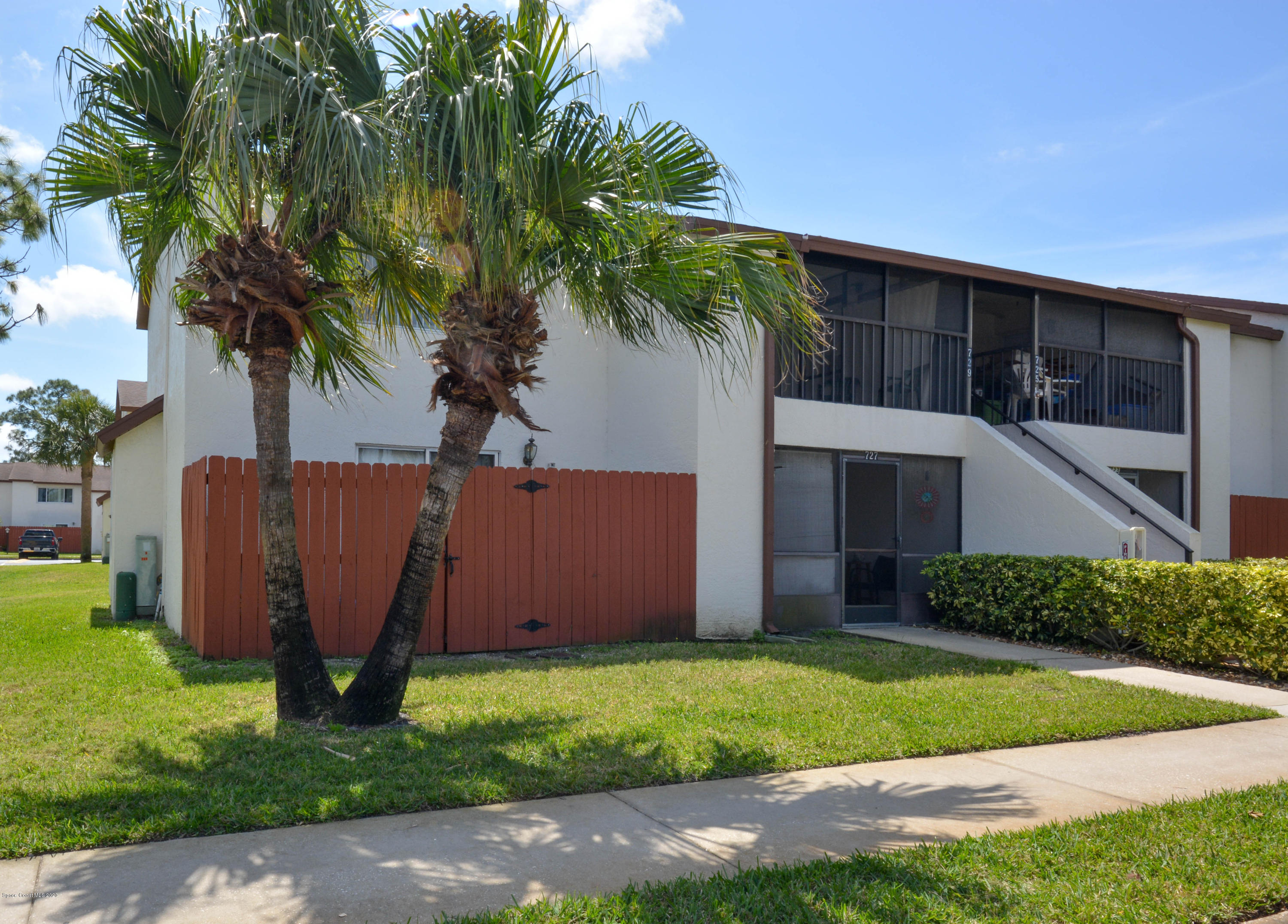 610 North Wickham Road, Unit 74 Melbourne, FL 32935 - Photo 27 of 46 a view of a backyard