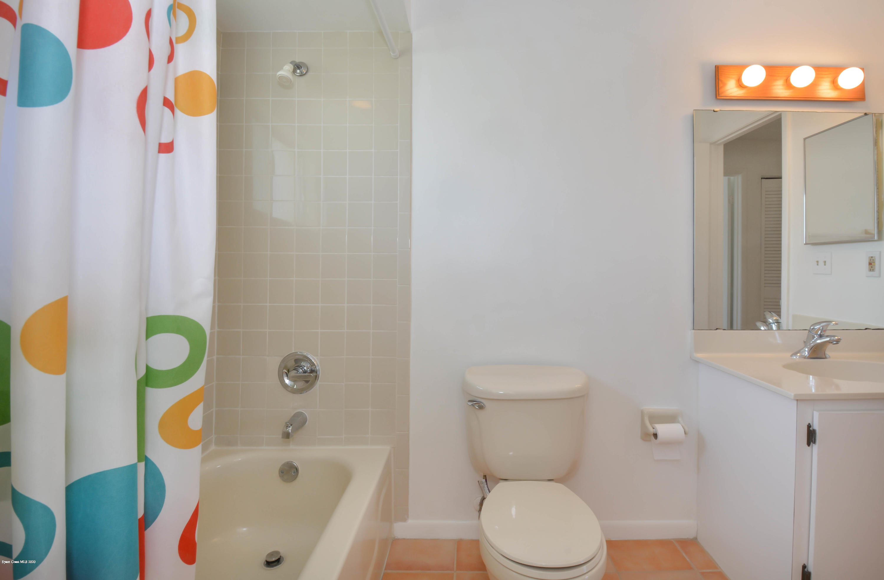610 North Wickham Road, Unit 74 Melbourne, FL 32935 - Photo 40 of 46 a bathroom with a sink and a toilet