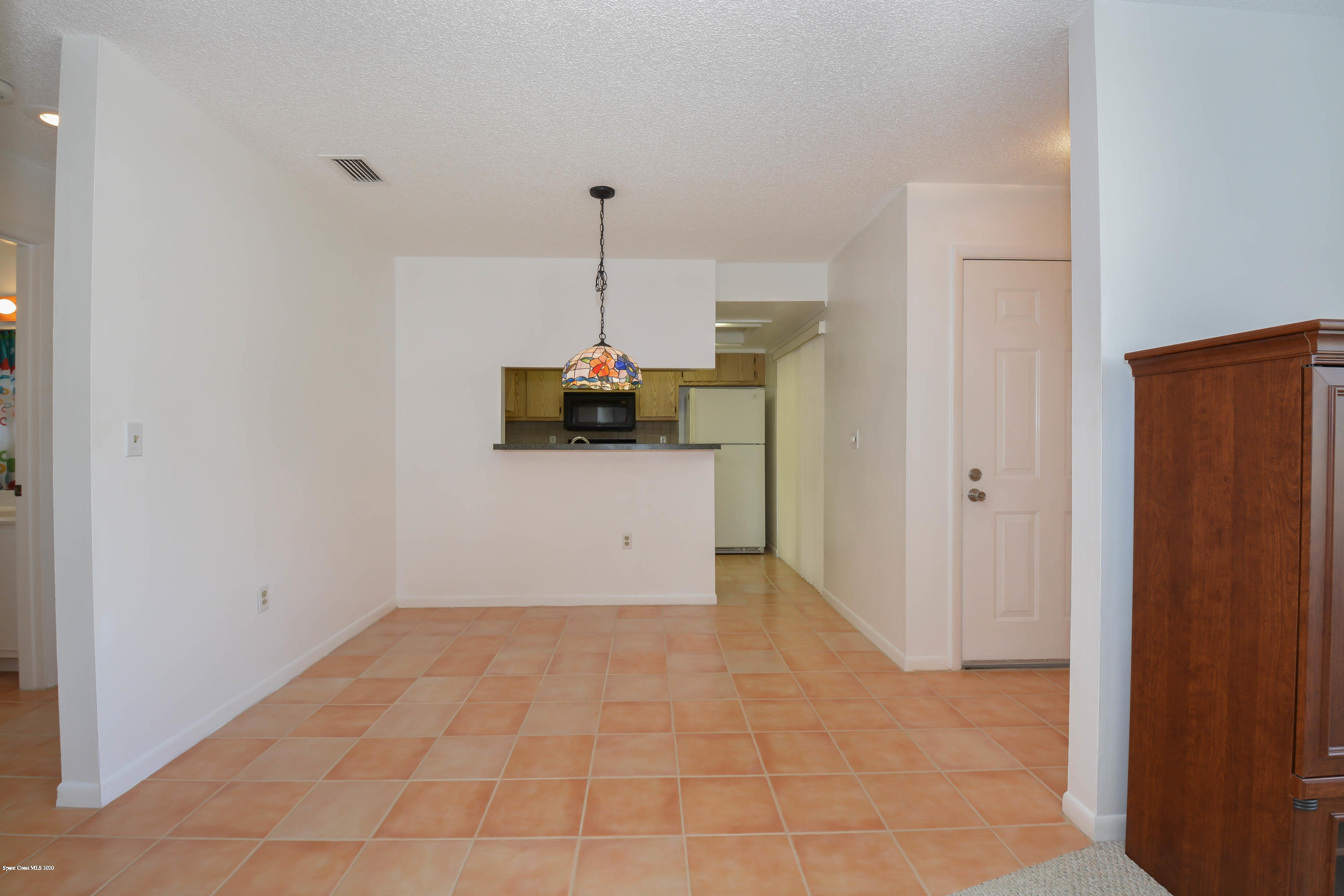 610 North Wickham Road, Unit 74 Melbourne, FL 32935 - Photo 9 of 46 a view of a storage & utility room with a sink