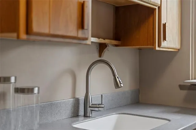 a bedroom with a bed and a table in it