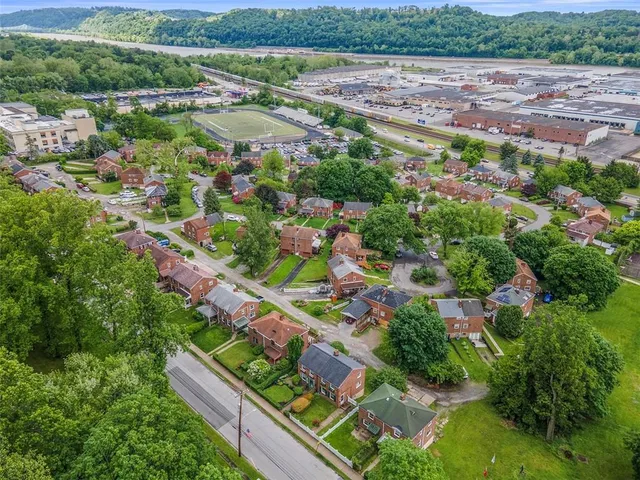 a view of a city from a balcony with outdoor space