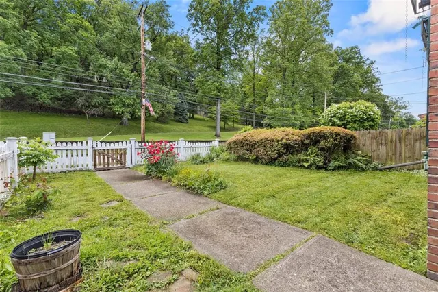 a garden view with a seating space