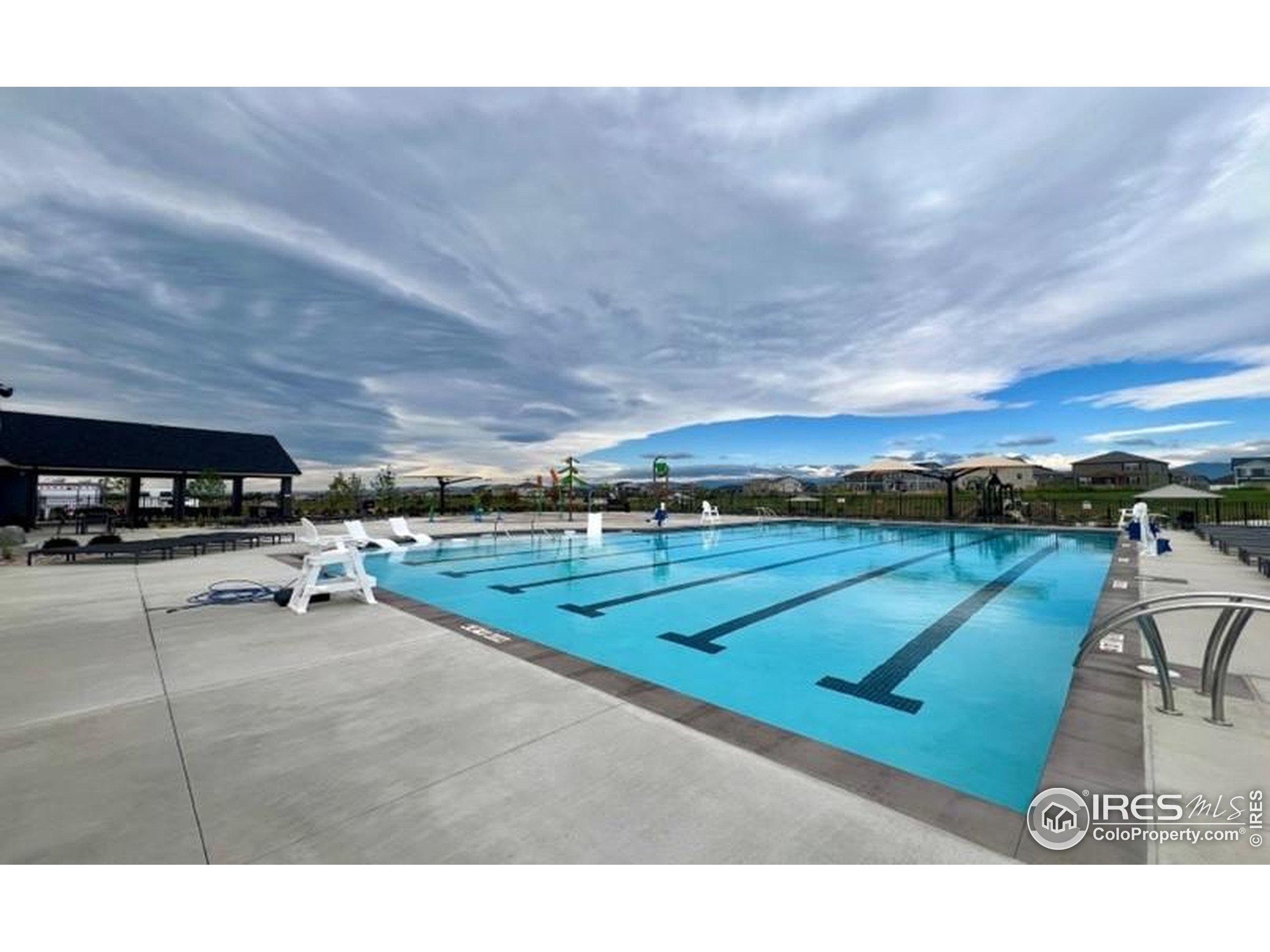 920 Logan Peak Way Berthoud, CO 80513 - Photo 31 of 35 a view of a swimming pool and lounge chair