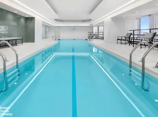 a kitchen with stainless steel appliances lots of counter top space