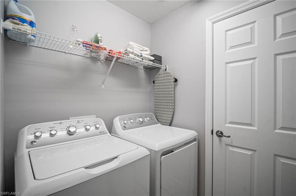 15919 Grassland Lane, Unit 4211 Babcock Ranch, FL 33982 - Photo 28 of 35 a utility room with dryer and washer