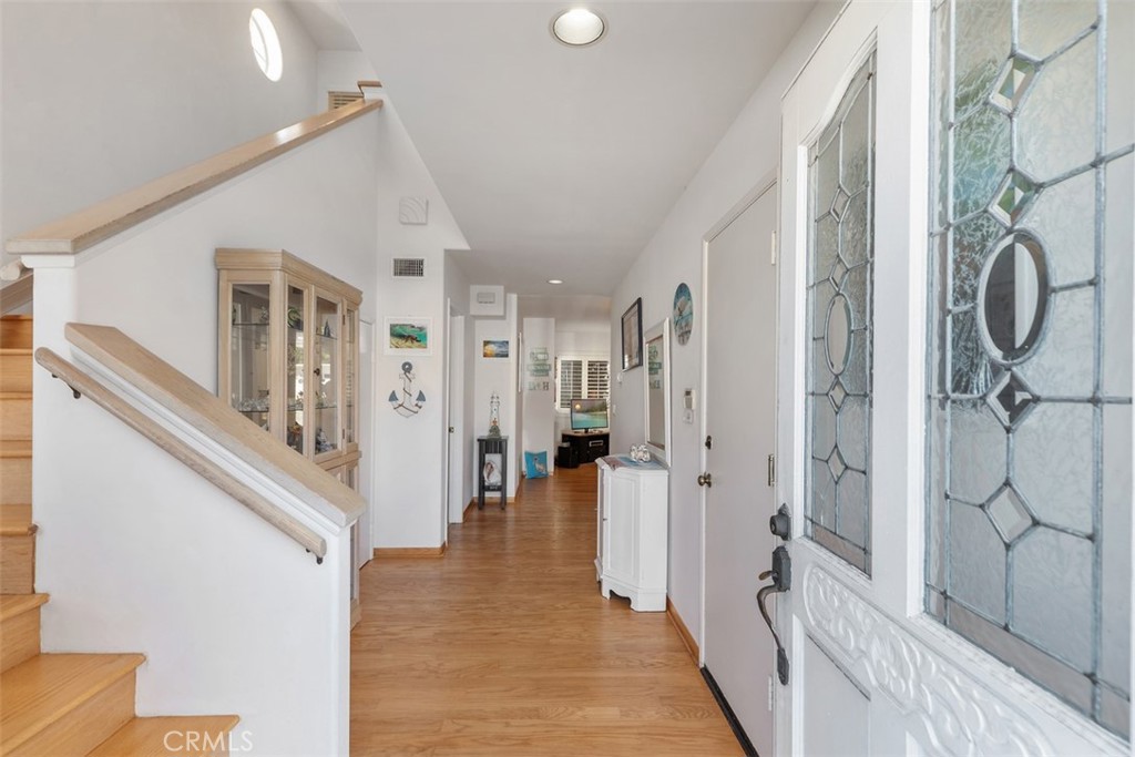 137 West Avenida Cornelio San Clemente, CA 92672 - Photo 3 of 48 a view of a hallway with wooden floor and staircase