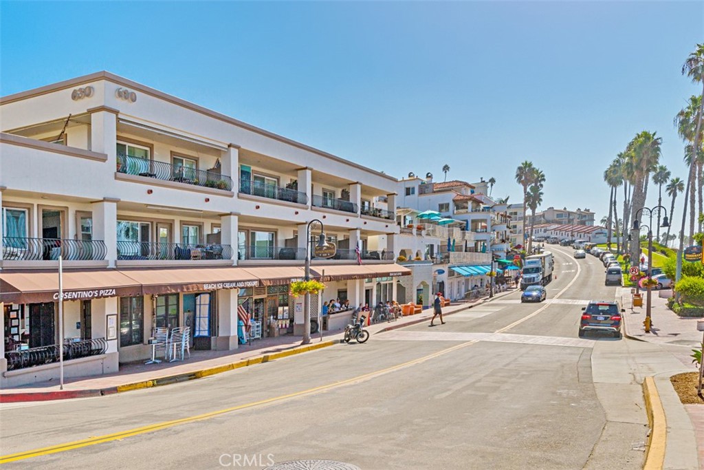 137 West Avenida Cornelio San Clemente, CA 92672 - Photo 32 of 48 a city street lined with tall buildings and a street