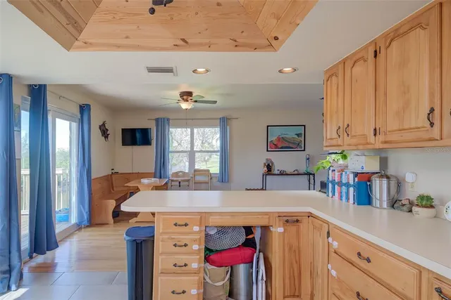 a kitchen with stainless steel appliances granite countertop a sink and cabinets