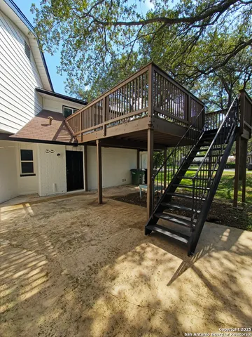 a front view of a house with parking space