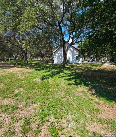 a fire hydrant in the middle of a field