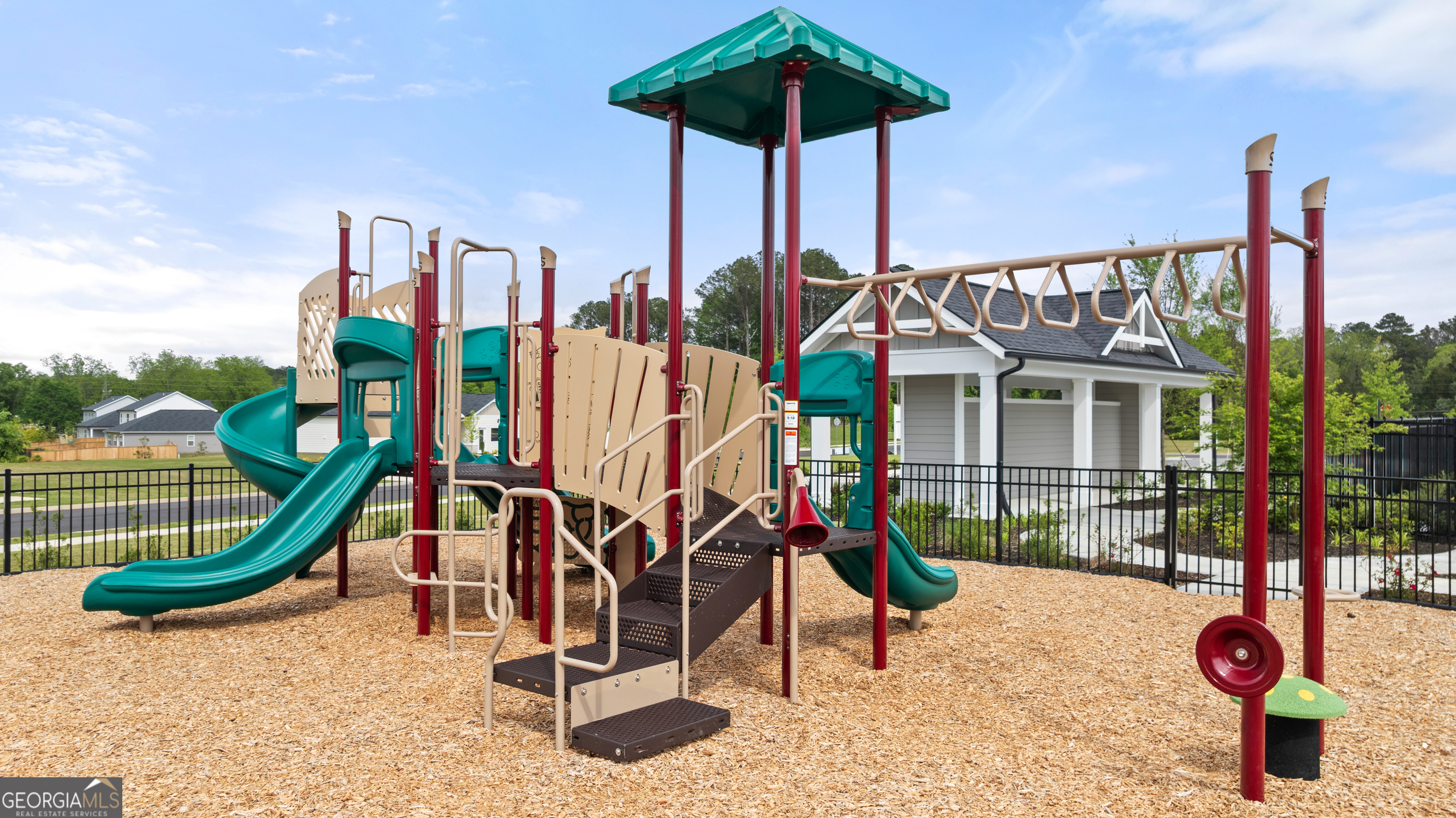 8583 Preakness Pass Snellville, GA 30039 - Photo 30 of 30 a view of outdoor space with a slide and swing