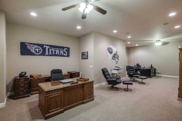 1400 Franklin Road Brentwood, TN 37027 - Photo 13 of 20 On the walk out lower level there is a large room that is currently being used as office space but could be a bonus room or work out room. Downstairs has 10 foot ceilings throughout.