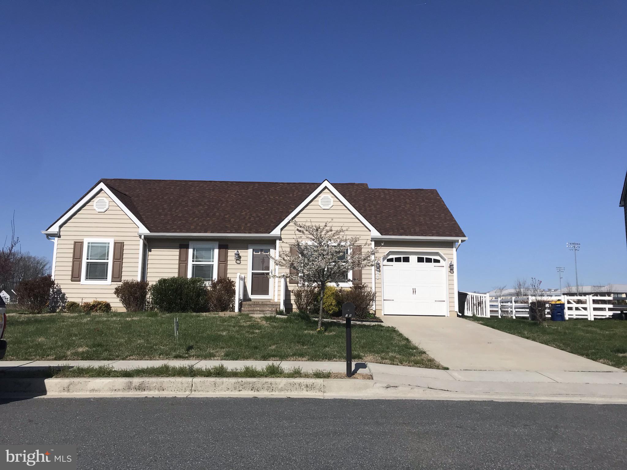 388 Northdown Drive Dover, DE 19904 - Photo 1 of 2 a front view of a house with a yard
