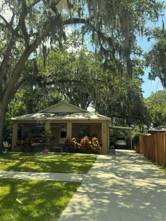 a view of a house with a swimming pool