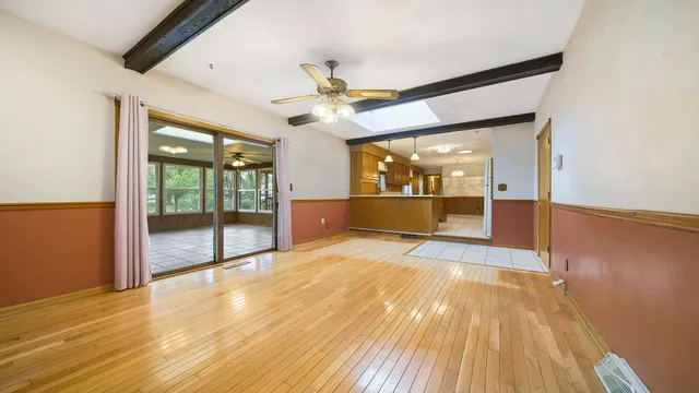 a view of an empty room with a large window