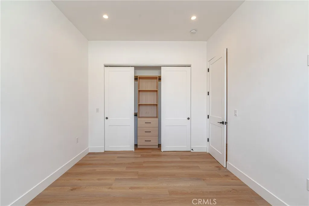 614 North Rampart Boulevard, Unit 1/2 Silver Lake, CA 90026 - Photo 29 of 41 an empty room with closet area