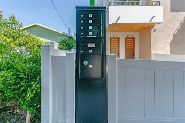 front view of a house with a small yard