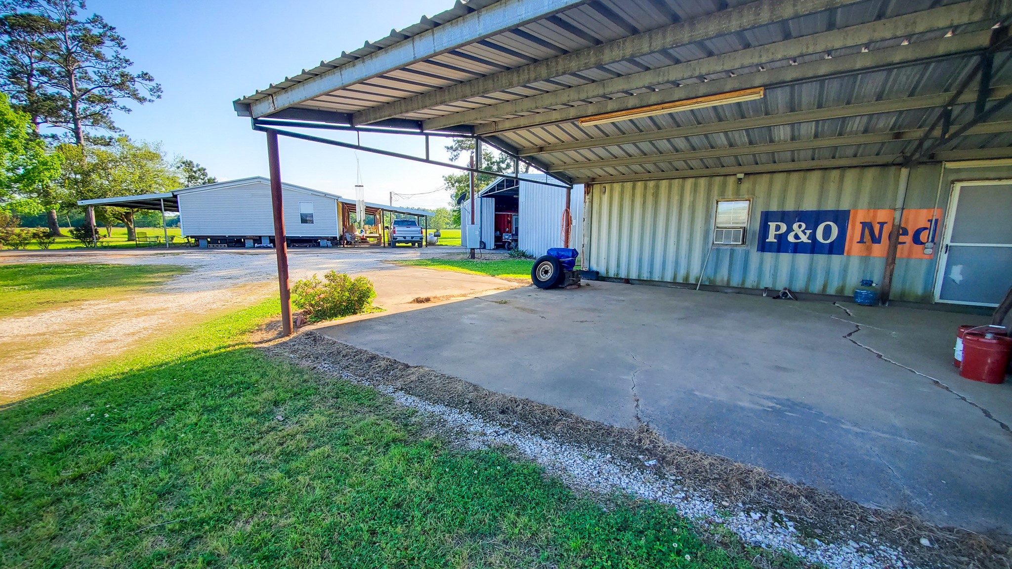 40902 Highway 105 Batson, TX 77519 - Photo 32 of 50 a view of a swimming pool with a yard