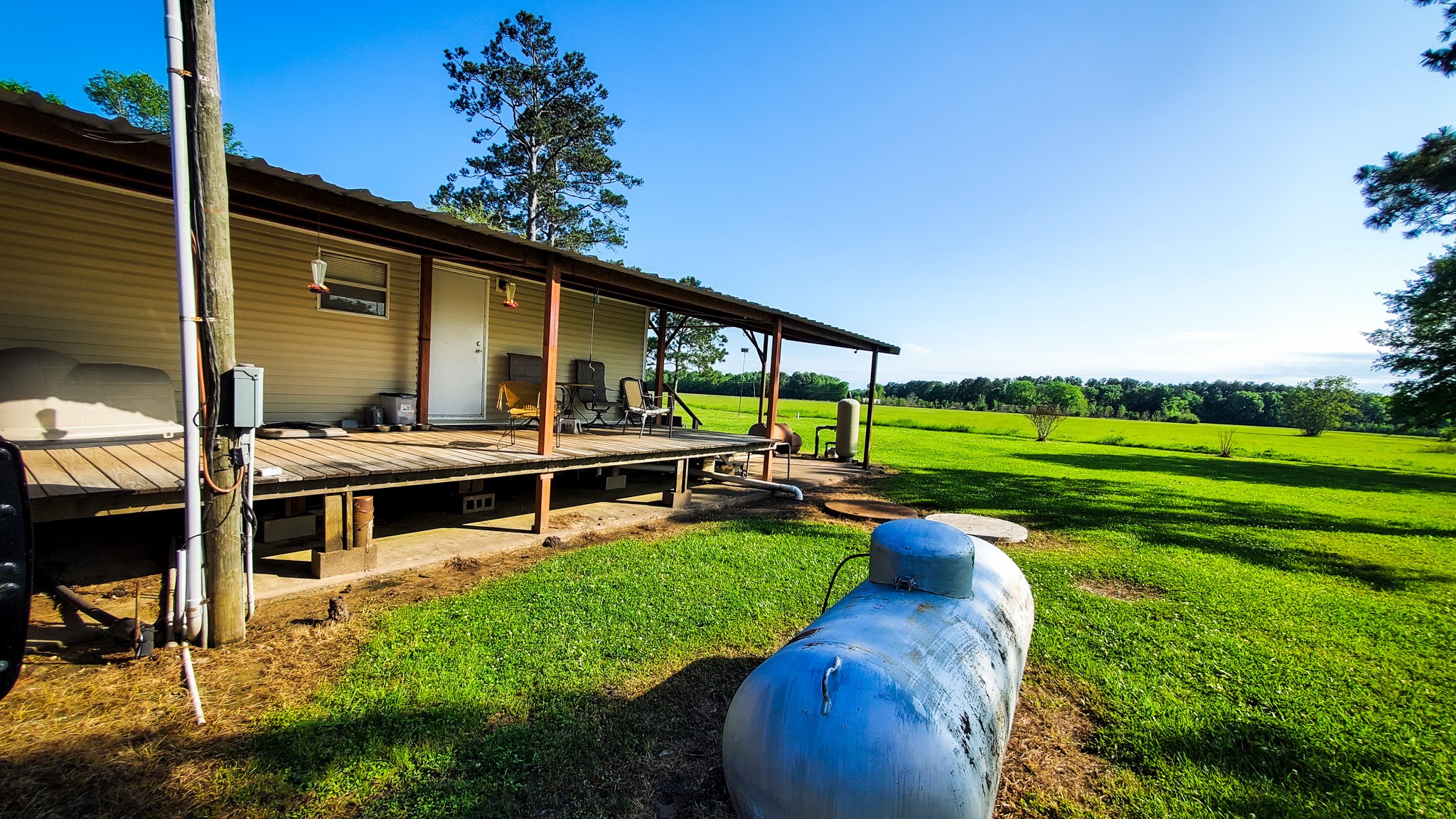 40902 Highway 105 Batson, TX 77519 - Photo 34 of 50 a view of a house with backyard porch and sitting area
